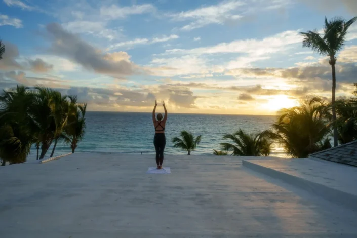 Runaway Hill Hero Image lady going yoga on the beach